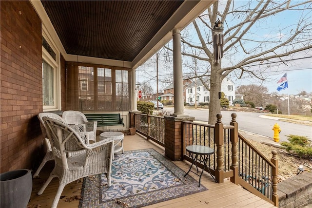 deck featuring a porch