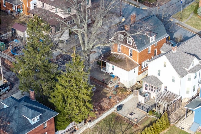 birds eye view of property with a residential view