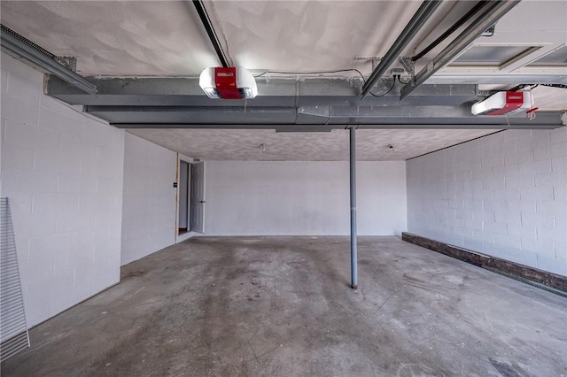 parking deck featuring a garage door opener