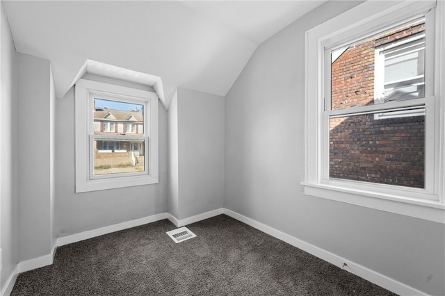 47 Bellanca Ave, Brentwood, PA 15227 - bonus room with visible vents, dark carpet, baseboards, and vaulted ceiling
