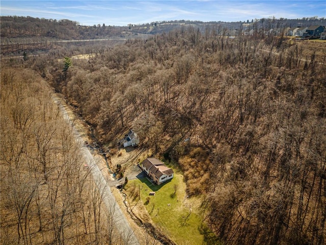 bird's eye view featuring a forest view