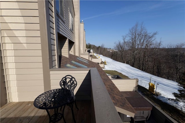 view of snow covered deck