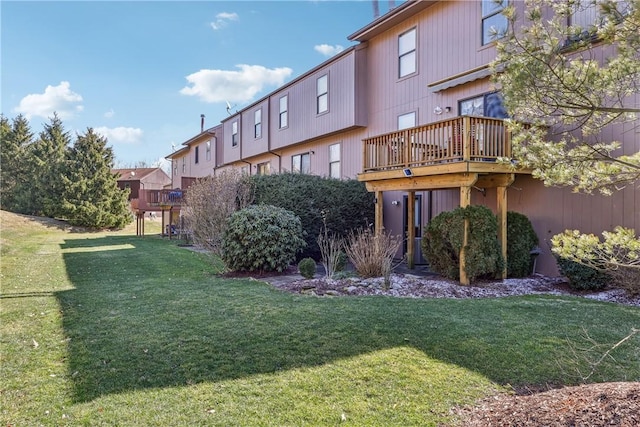 view of yard featuring a wooden deck