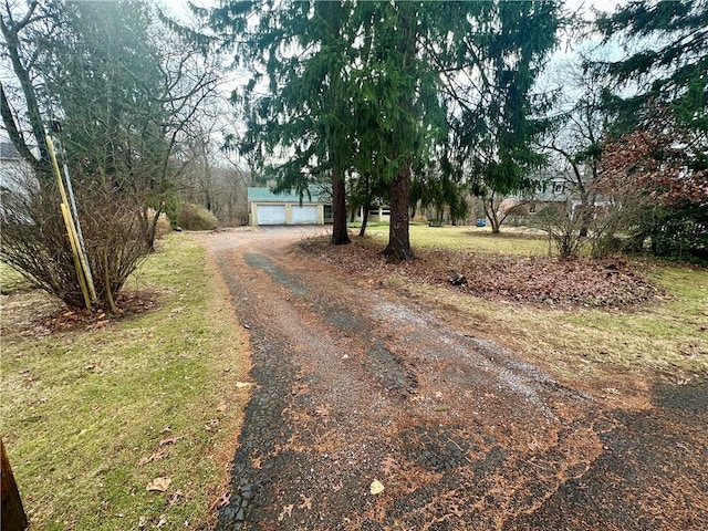 view of road with driveway