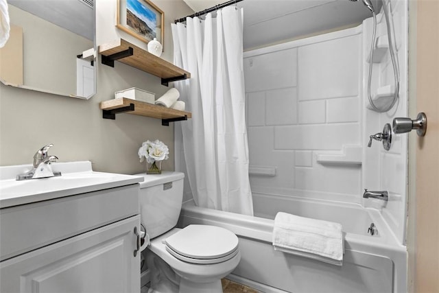 full bathroom featuring toilet, vanity, and shower / bath combination with curtain