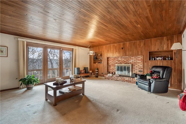 living area with wooden ceiling, wooden walls, carpet flooring, and french doors