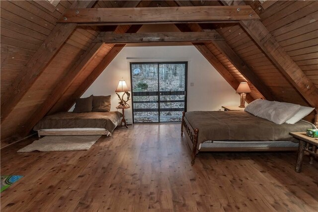 bedroom with access to exterior, vaulted ceiling with beams, wood ceiling, and hardwood / wood-style floors