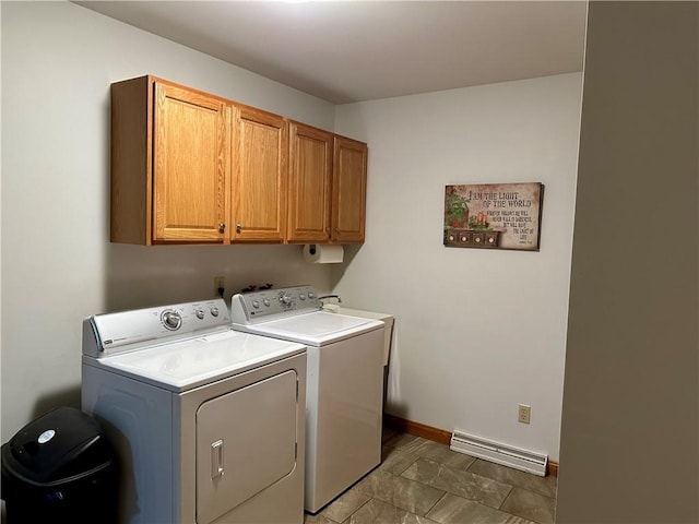 clothes washing area with baseboards, visible vents, cabinet space, and independent washer and dryer