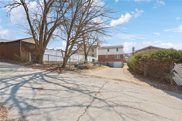 view of road with driveway