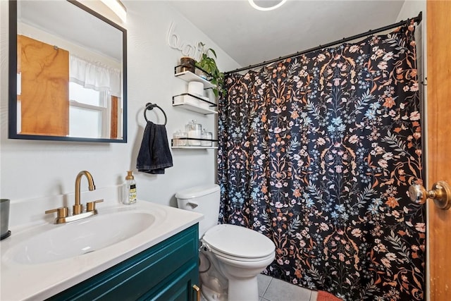 bathroom featuring tile patterned flooring, toilet, vanity, and a shower with curtain