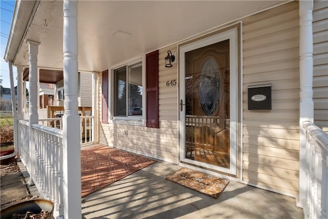 doorway to property featuring a porch