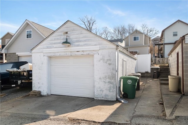 garage with fence