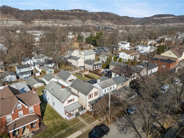 bird's eye view with a residential view and a mountain view