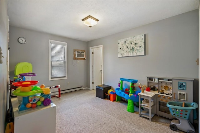 game room with a baseboard heating unit, a wall unit AC, and carpet floors