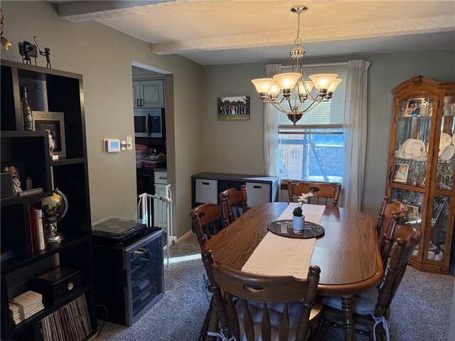 carpeted dining space with beamed ceiling and a notable chandelier