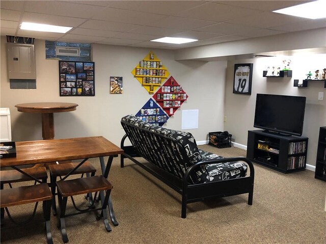 game room featuring carpet flooring, electric panel, baseboards, and a drop ceiling