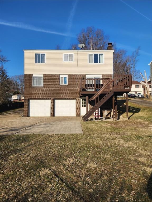 exterior space featuring driveway, an attached garage, stairs, a deck, and brick siding