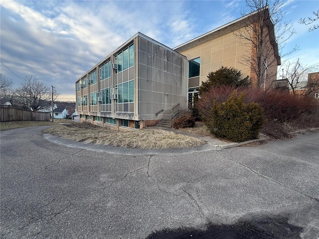 view of building exterior with entry steps