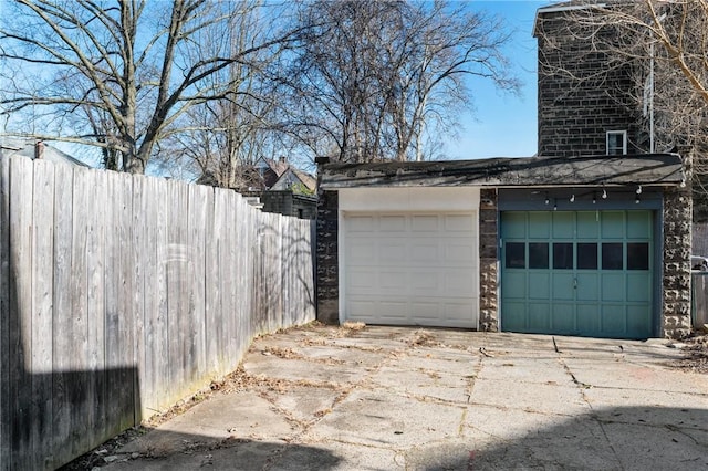 detached garage with fence