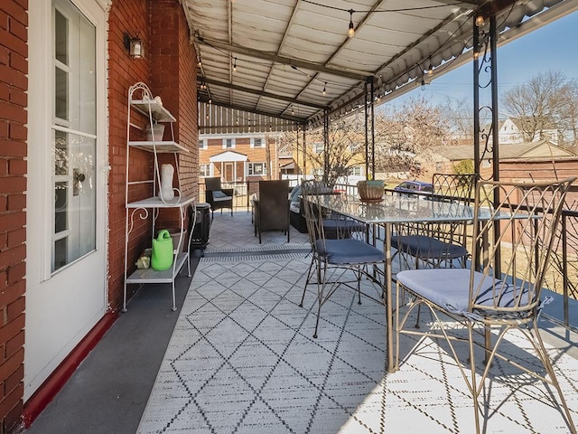 view of patio with outdoor dining area