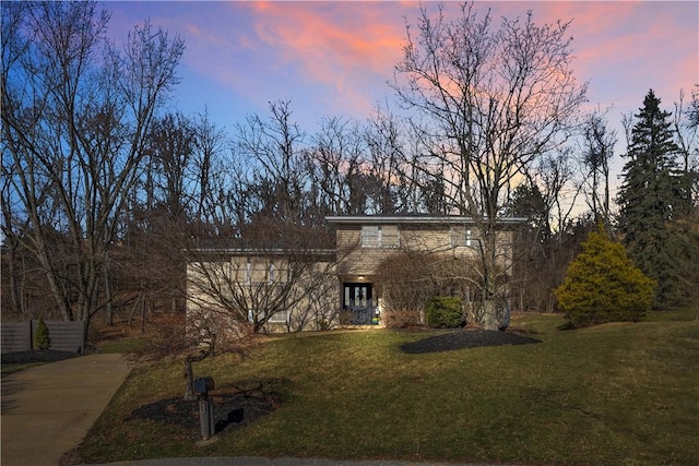 view of front of home featuring a yard