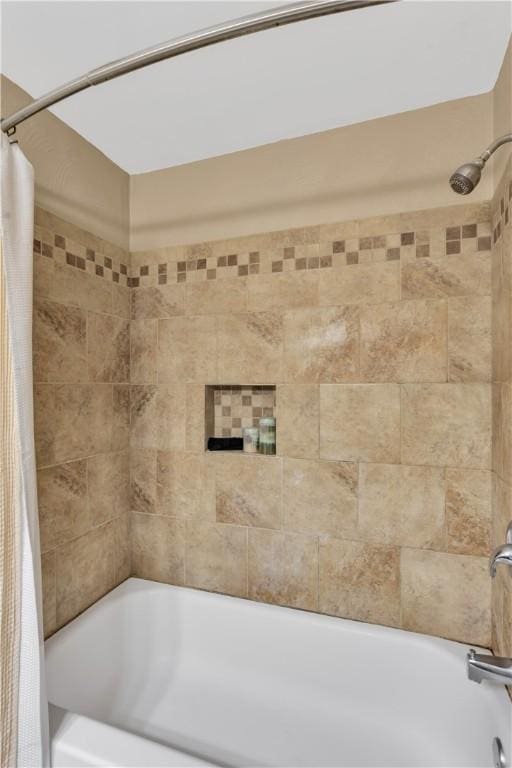 full bath with shower / bath combination with curtain