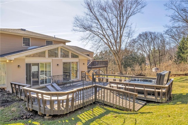 wooden terrace featuring a yard