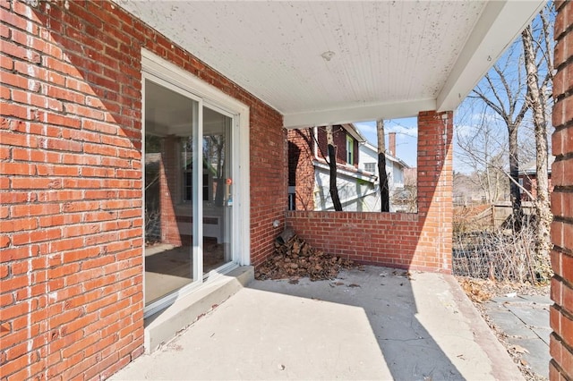 view of patio / terrace featuring fence