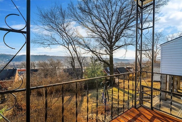 balcony featuring a mountain view