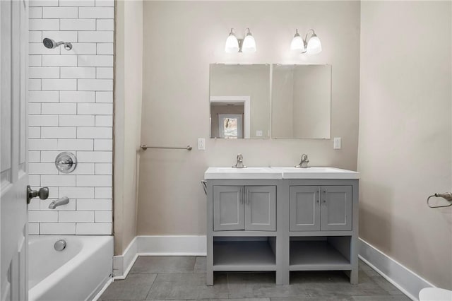 bathroom with a sink, tile patterned flooring, double vanity, baseboards, and bathing tub / shower combination