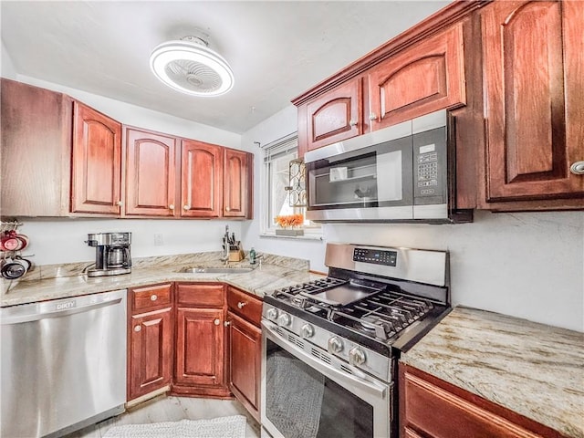 kitchen with a sink and stainless steel appliances