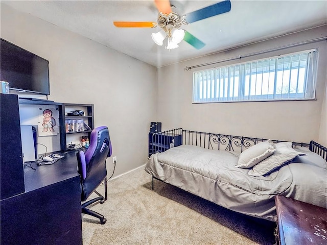 bedroom featuring carpet flooring, baseboards, and ceiling fan