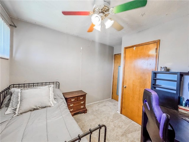 bedroom featuring carpet and ceiling fan