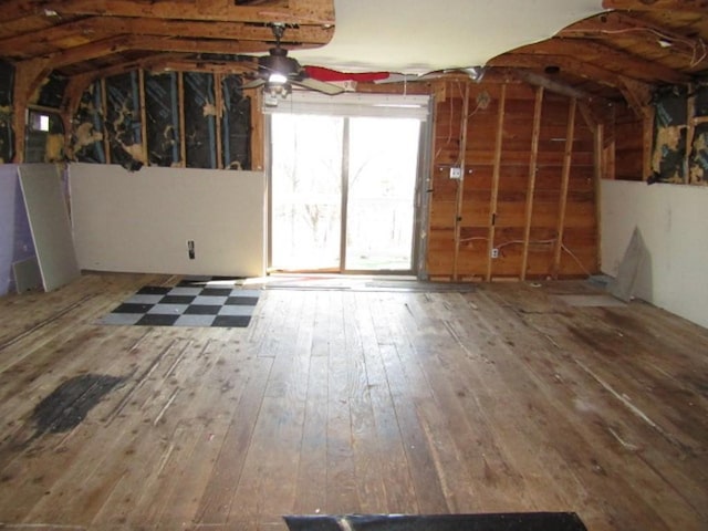 misc room with lofted ceiling and hardwood / wood-style flooring