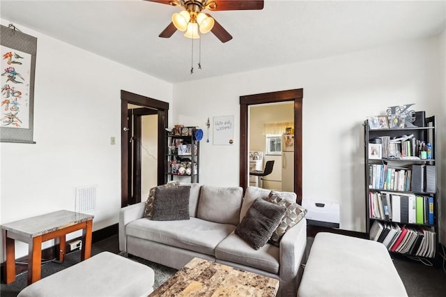 living room with a ceiling fan