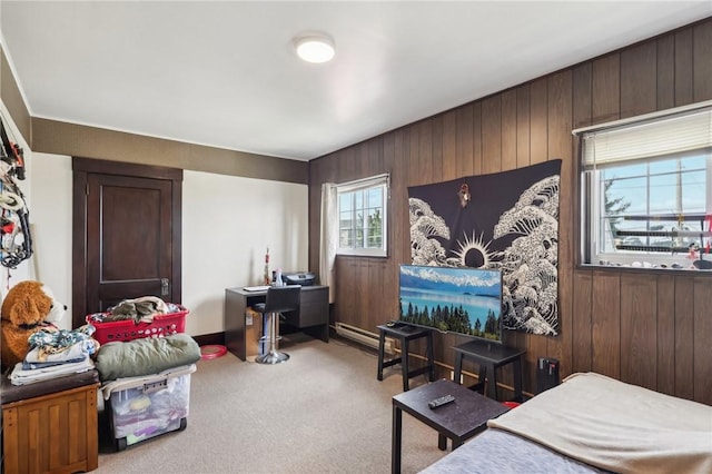 carpeted bedroom with wood walls