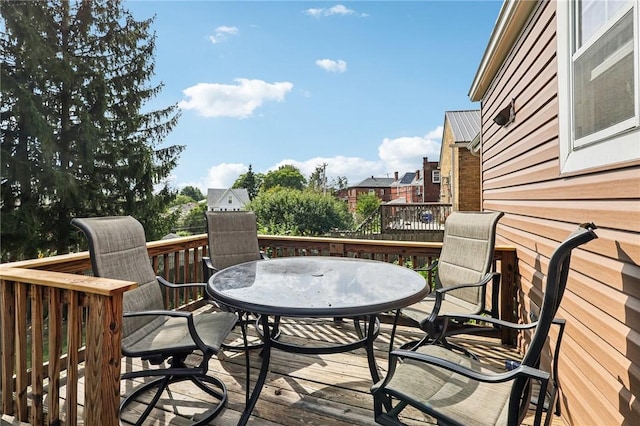 deck with outdoor dining space