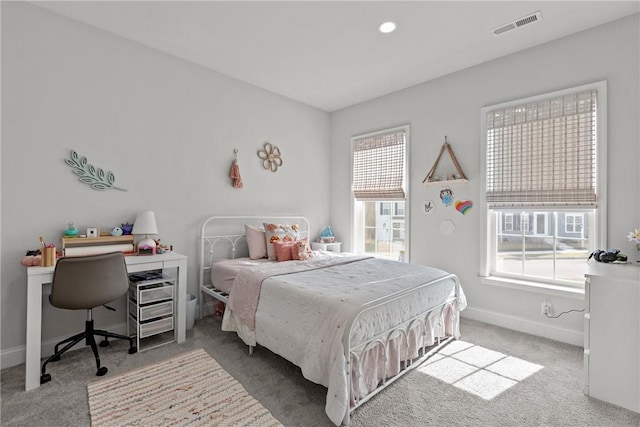 carpeted bedroom with visible vents, recessed lighting, and baseboards