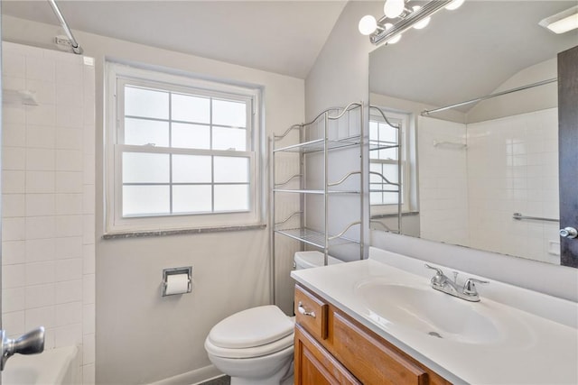 full bathroom with shower / tub combination, toilet, vanity, and lofted ceiling