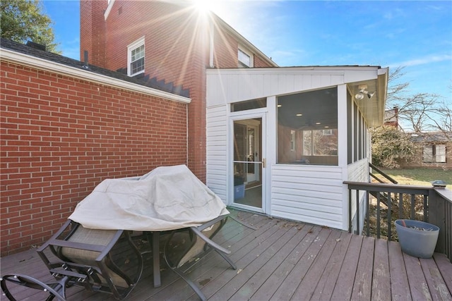 deck featuring a sunroom