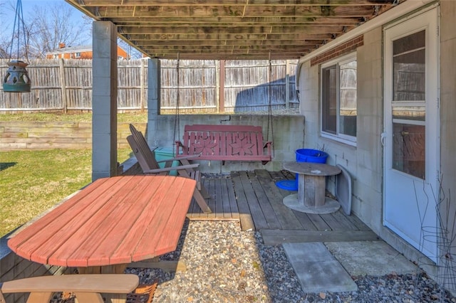 wooden deck featuring fence