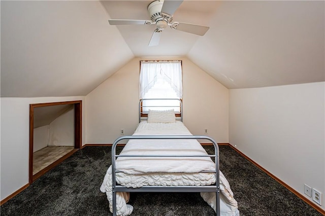 bedroom with lofted ceiling, a ceiling fan, baseboards, and carpet floors