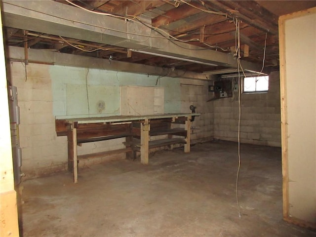 basement with a workshop area