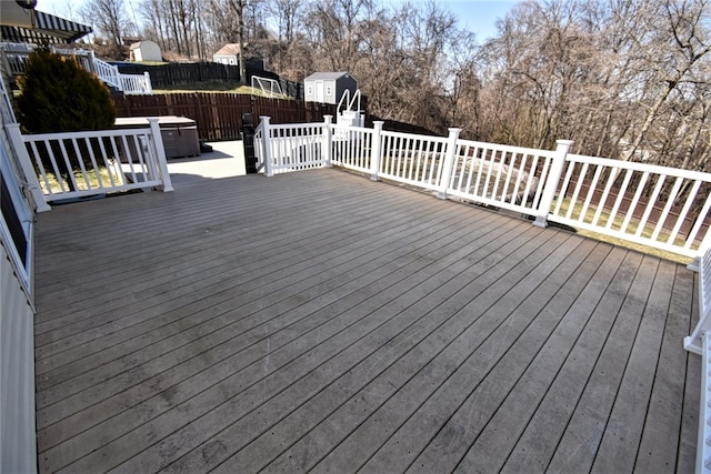 deck featuring central air condition unit and fence