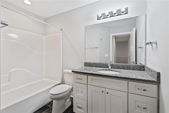 full bathroom featuring tile patterned floors, shower / bathing tub combination, toilet, and vanity