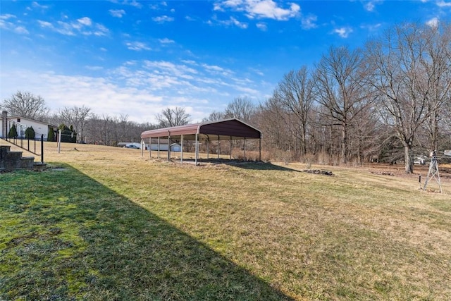 view of yard with a detached carport