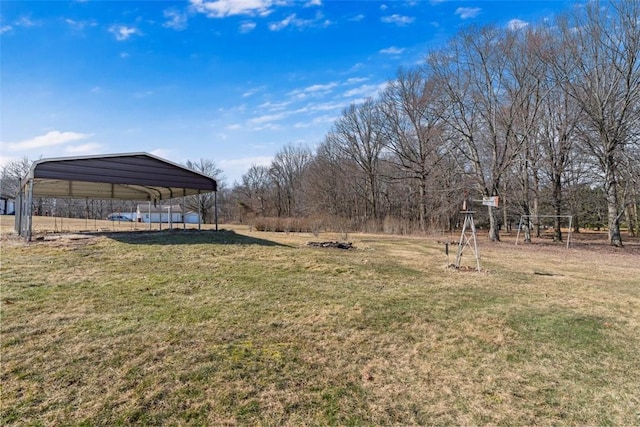 view of yard with a detached carport