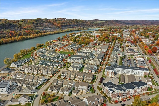 aerial view with a residential view and a water view