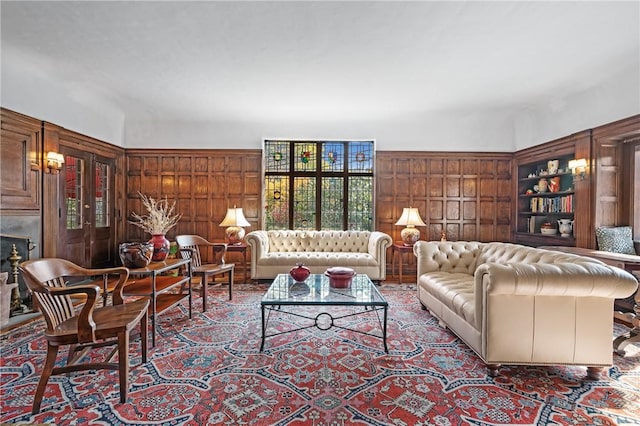 living area featuring wooden walls