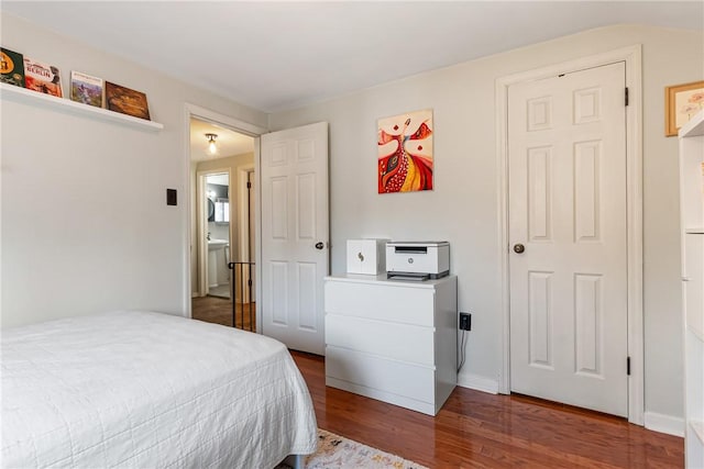 bedroom featuring wood finished floors